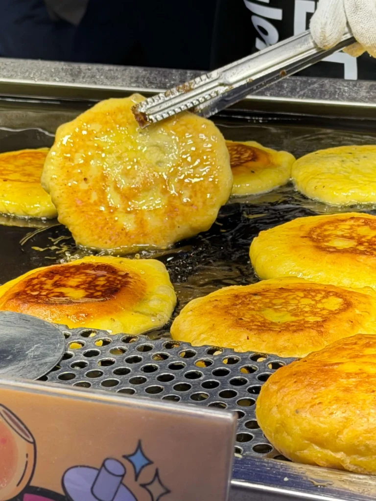 famous street food in Seoul: hotteok (Korean sweet pancakes)